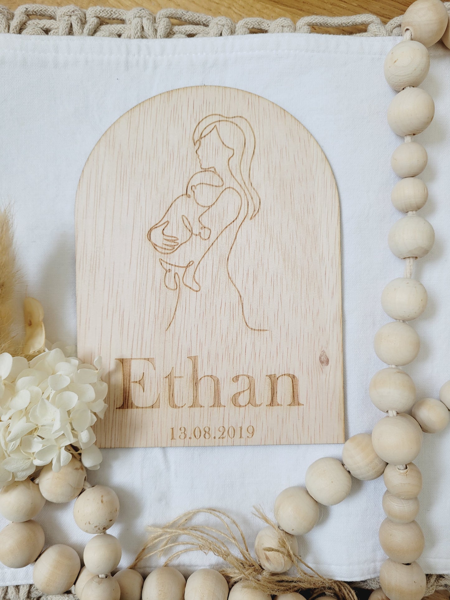 Line drawing and Birth plaque