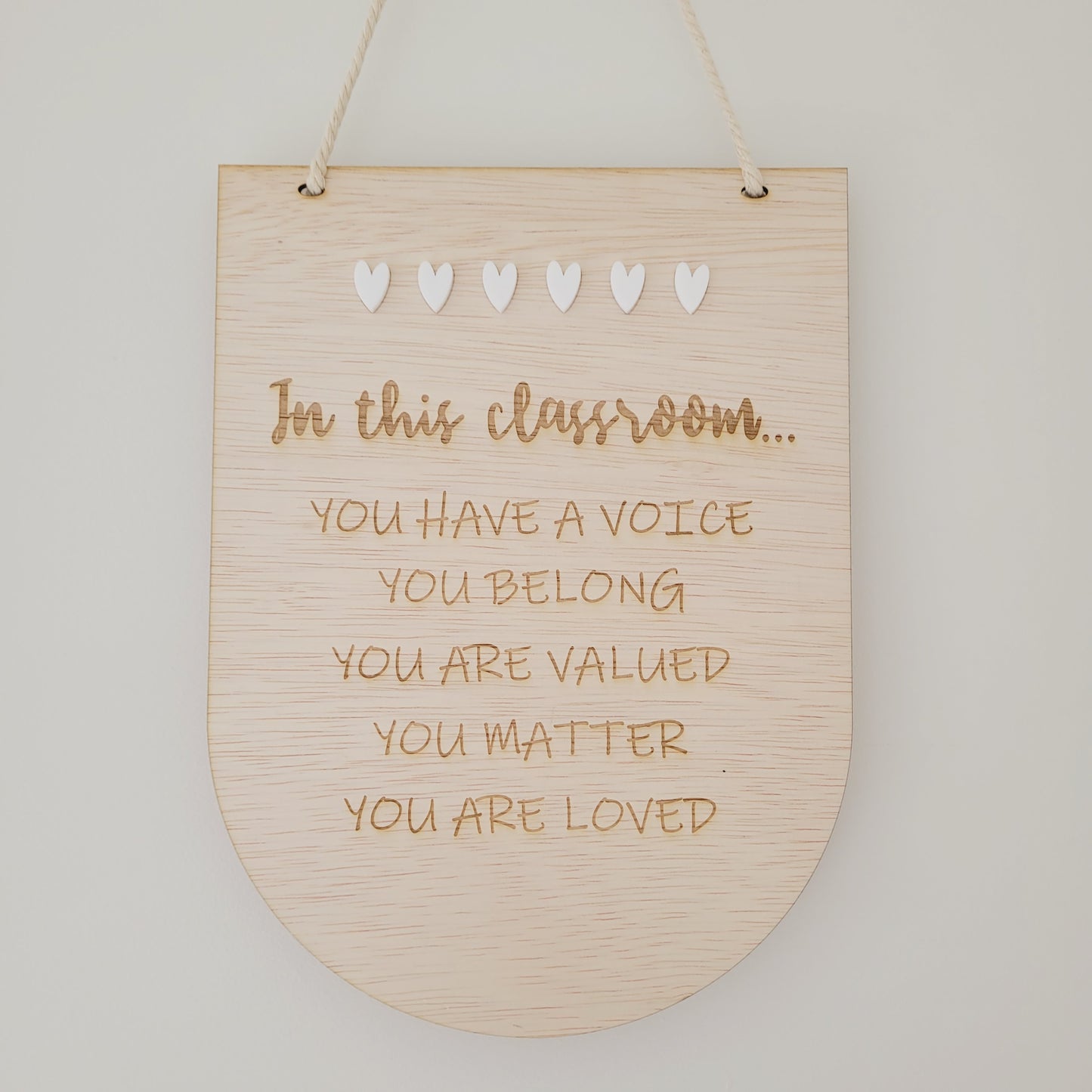 In this classroom plaque