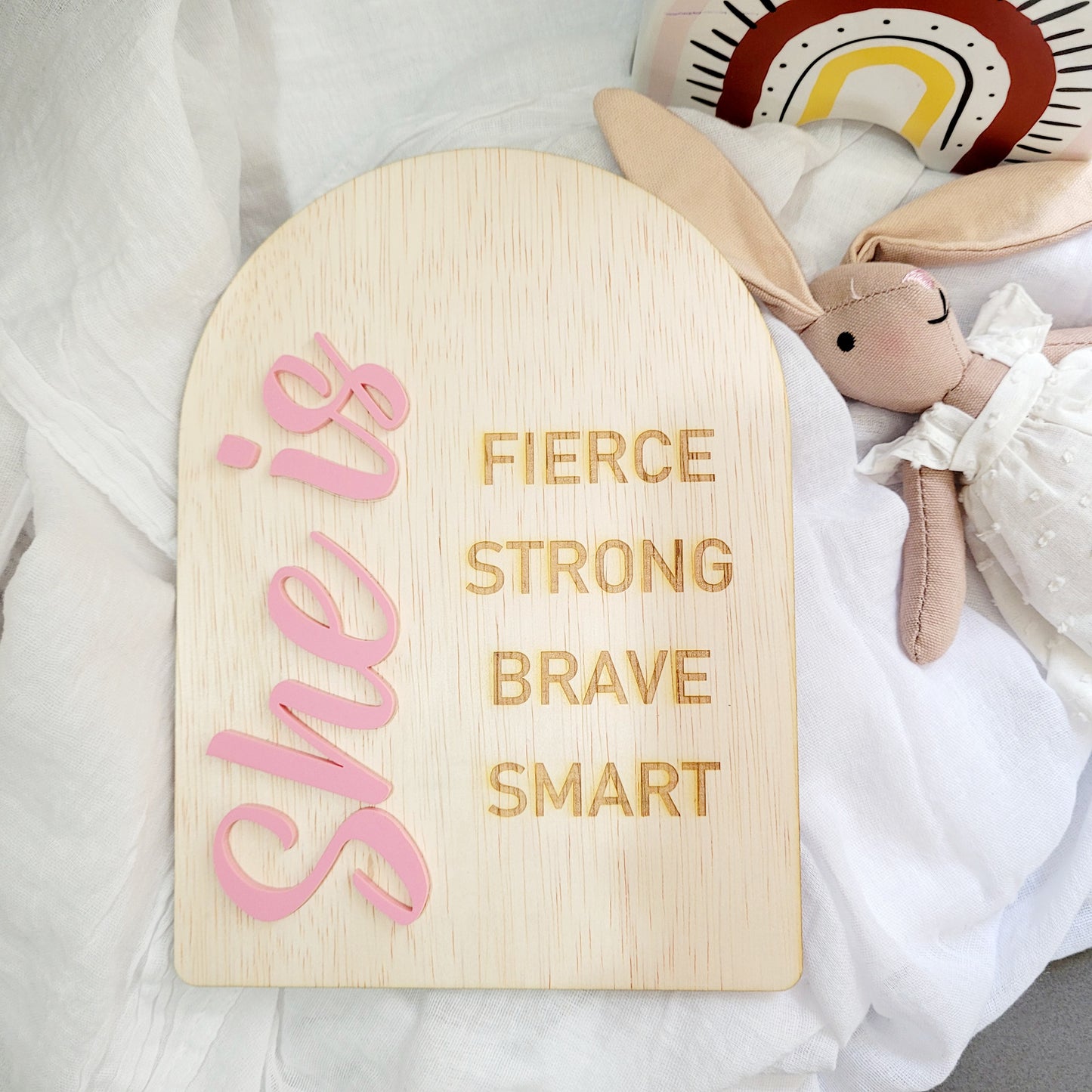 She / He is...plaque