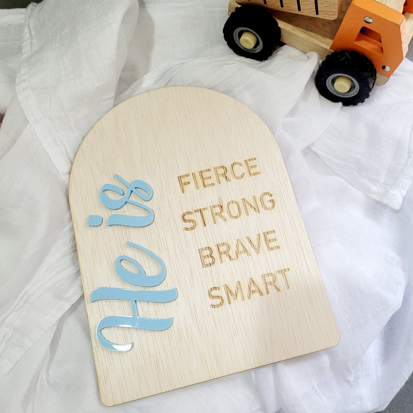 She / He is...plaque