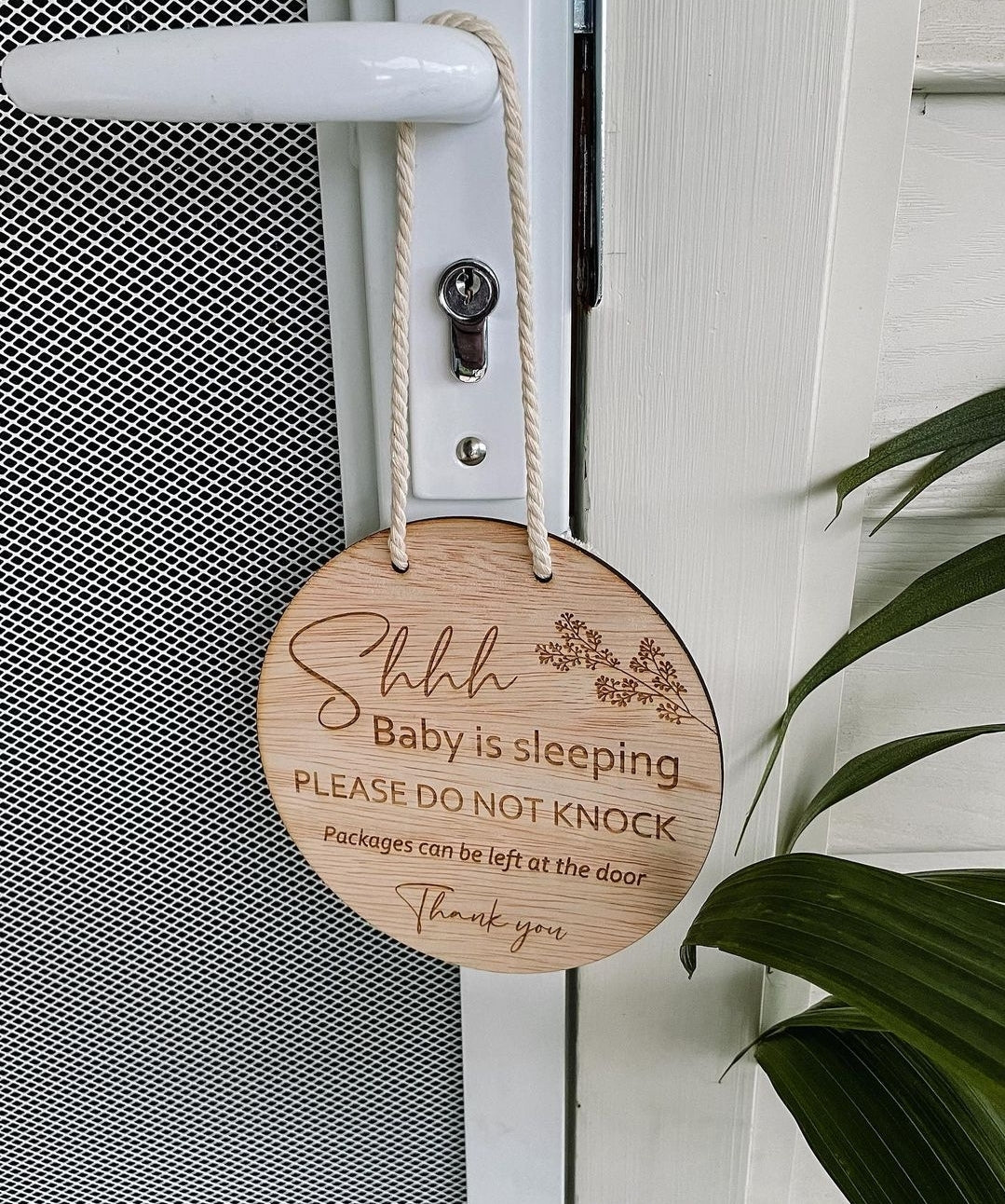 Baby is sleeping door sign