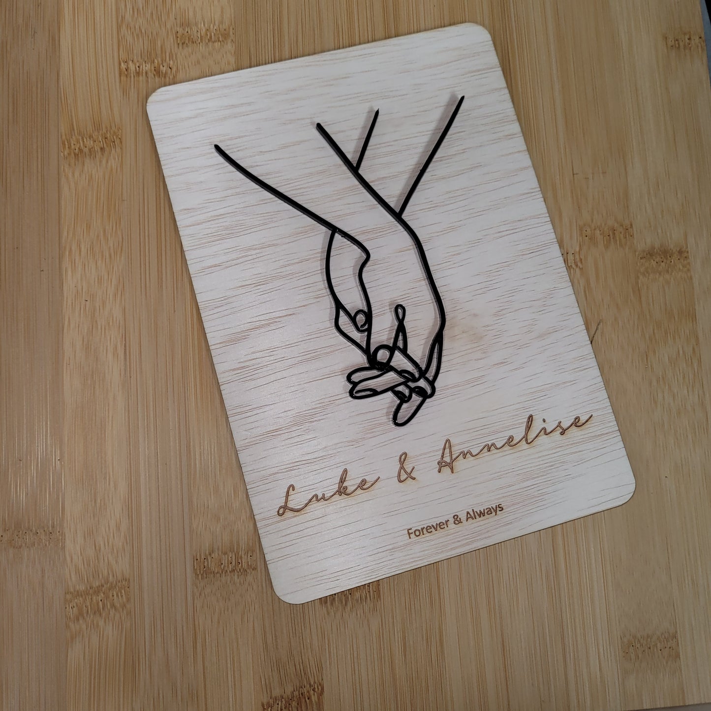 Holding hands plaque